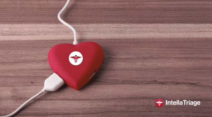 White wires connect in two different places to a red heart shaped hub with an IntellaTriage icon on it on a simple wooden background and the IntellaTriage logo within it.